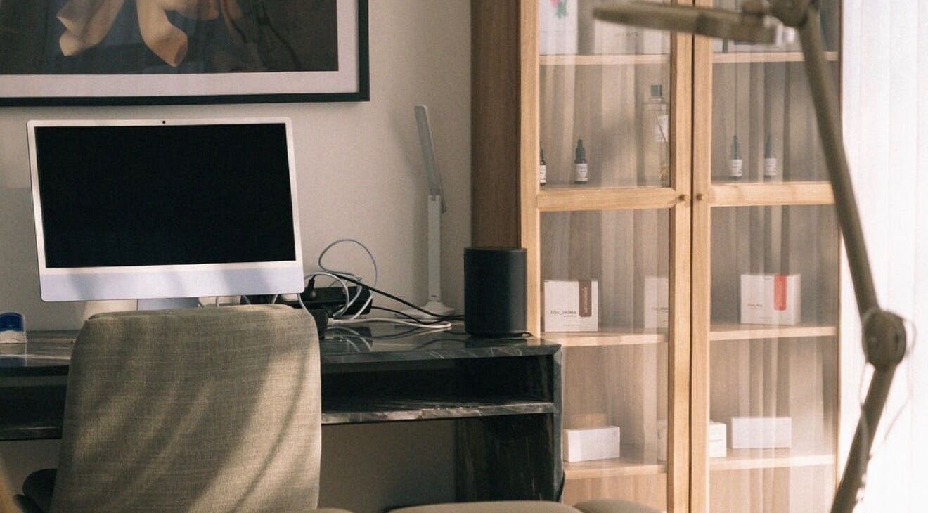 Clinica Luzé's consultation room with computer and shelves in Turramurra, New South Wales, AU.