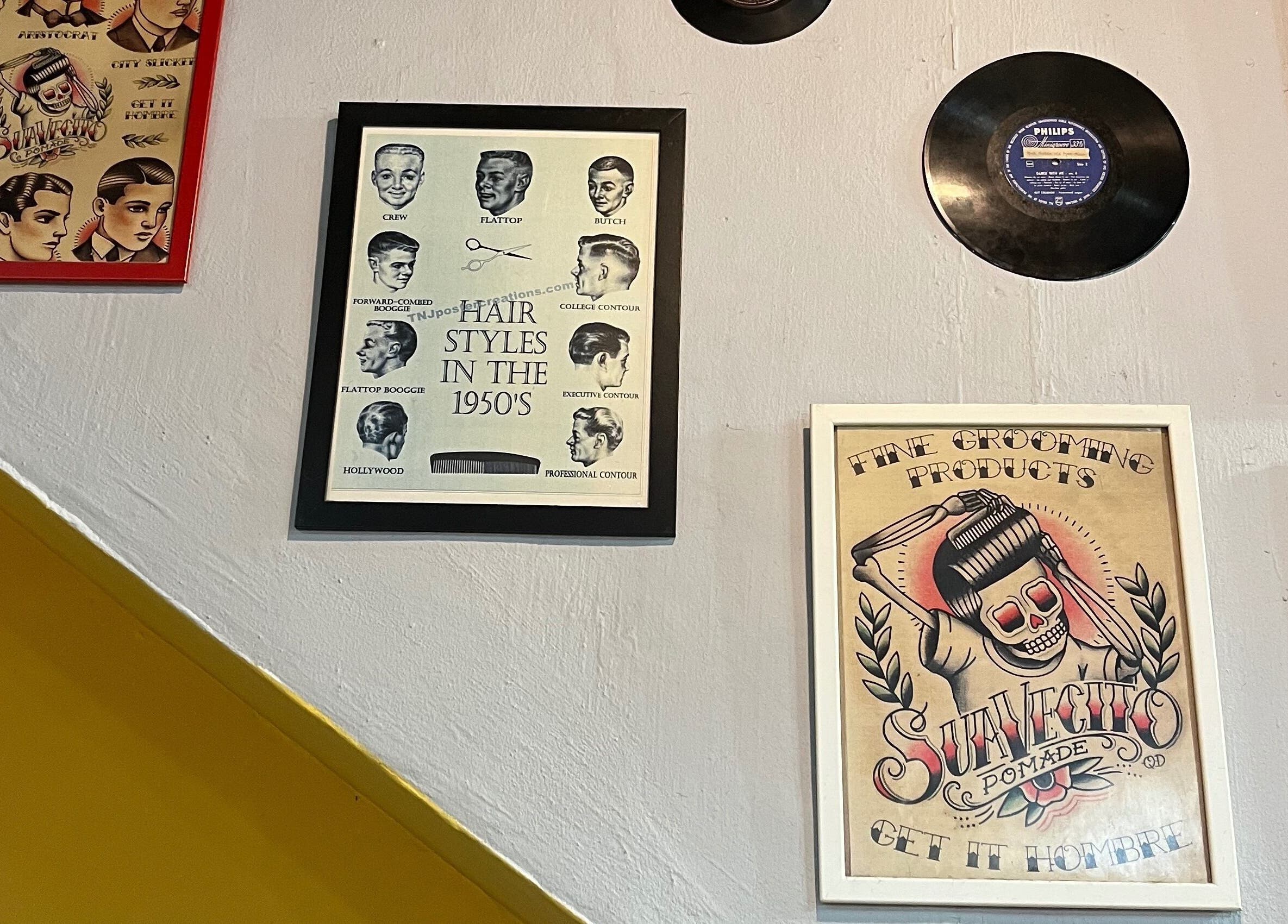 Vintage barber posters on display at Branko Barbershop, Bukit Mertajam, Pulau Pinang, MY, create a nostalgic ambiance.
