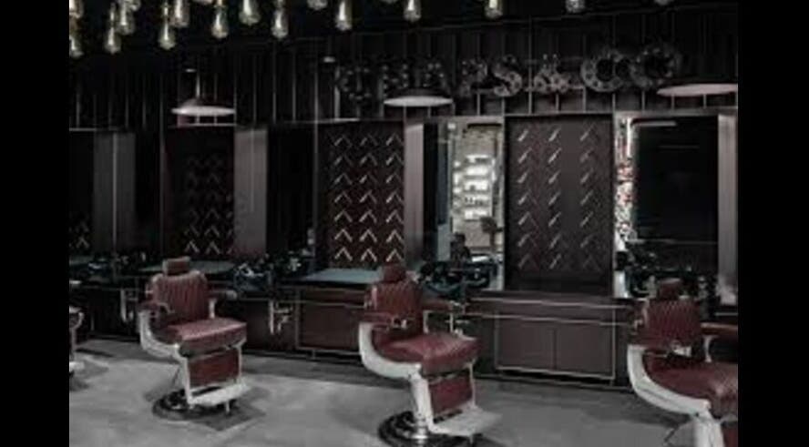 Stylish barber chairs at NBG Group, Conyers, Georgia, US, showcasing modern interior design.