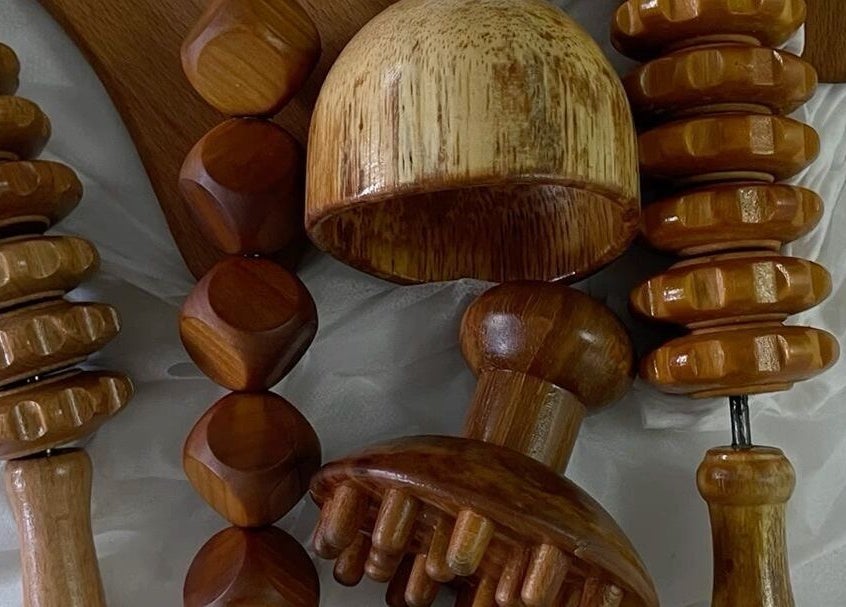 Wooden massage tools set at Firgunwellness Yerevan, Yerevan, AM, enhancing relaxation and wellness.