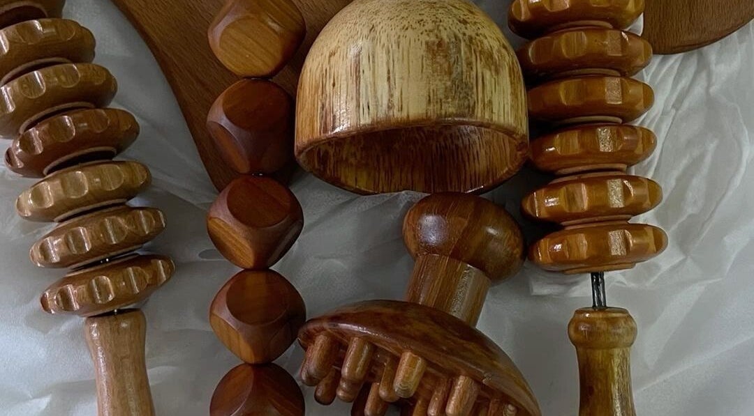 Wooden massage tools set at Firgunwellness Yerevan, Yerevan, AM, enhancing relaxation and wellness.