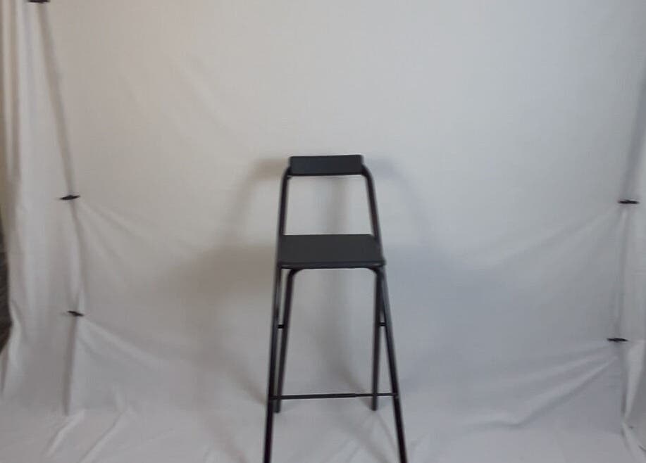 Minimalist photography setup at Lightspace photography, Hellevoetsluis, Zuid-holland, NL with a black stool.