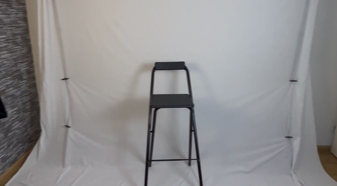 Minimalist photography setup at Lightspace photography, Hellevoetsluis, Zuid-holland, NL with a black stool.