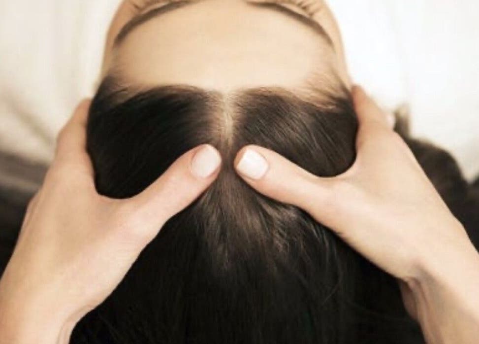 SPA MIL in Ashgrove, Queensland offers a soothing head massage for ultimate relaxation.