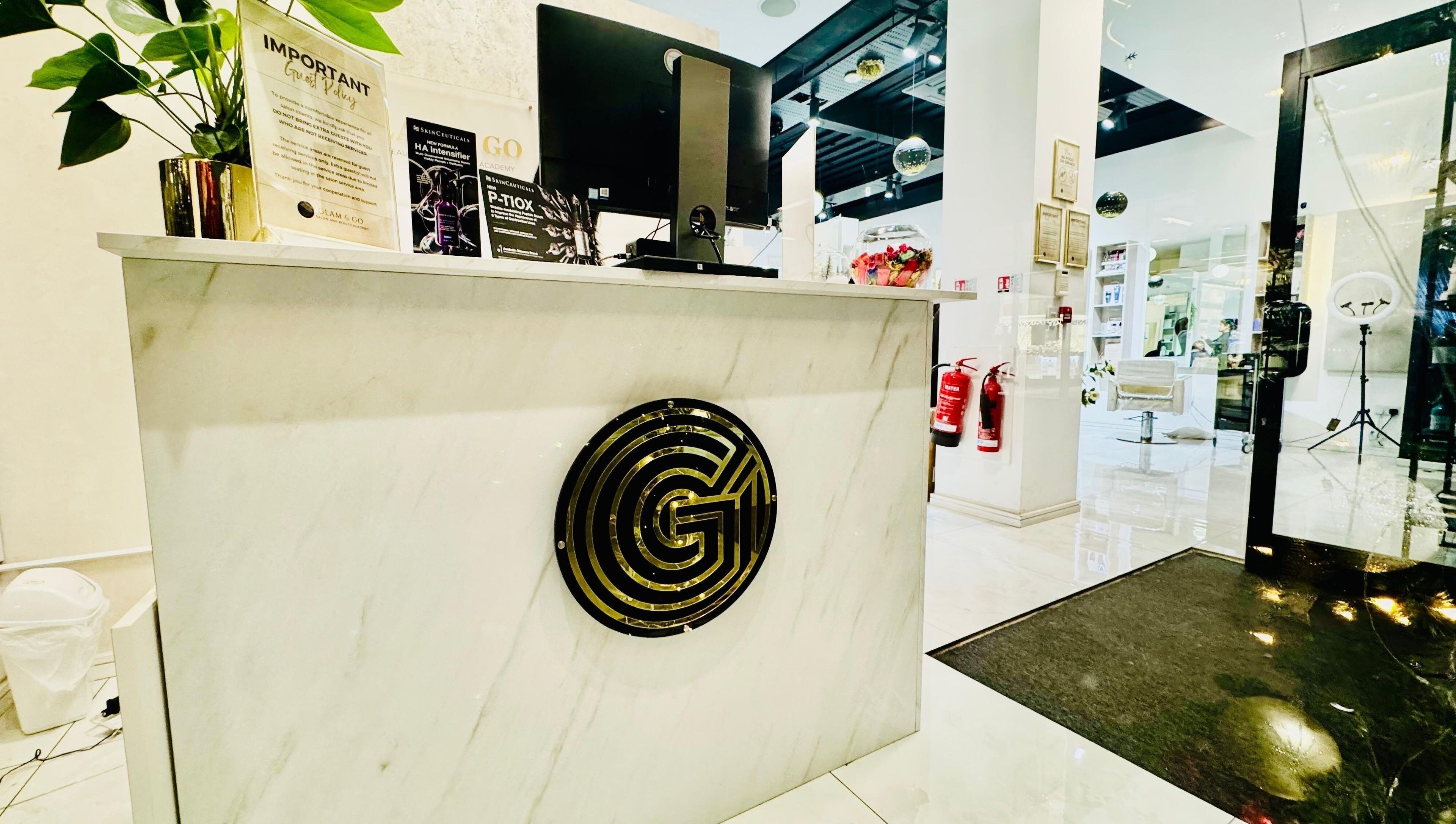 Chic reception at Glam & Go Hounslow, Hounslow, England, GB with modern decor and welcoming ambiance.