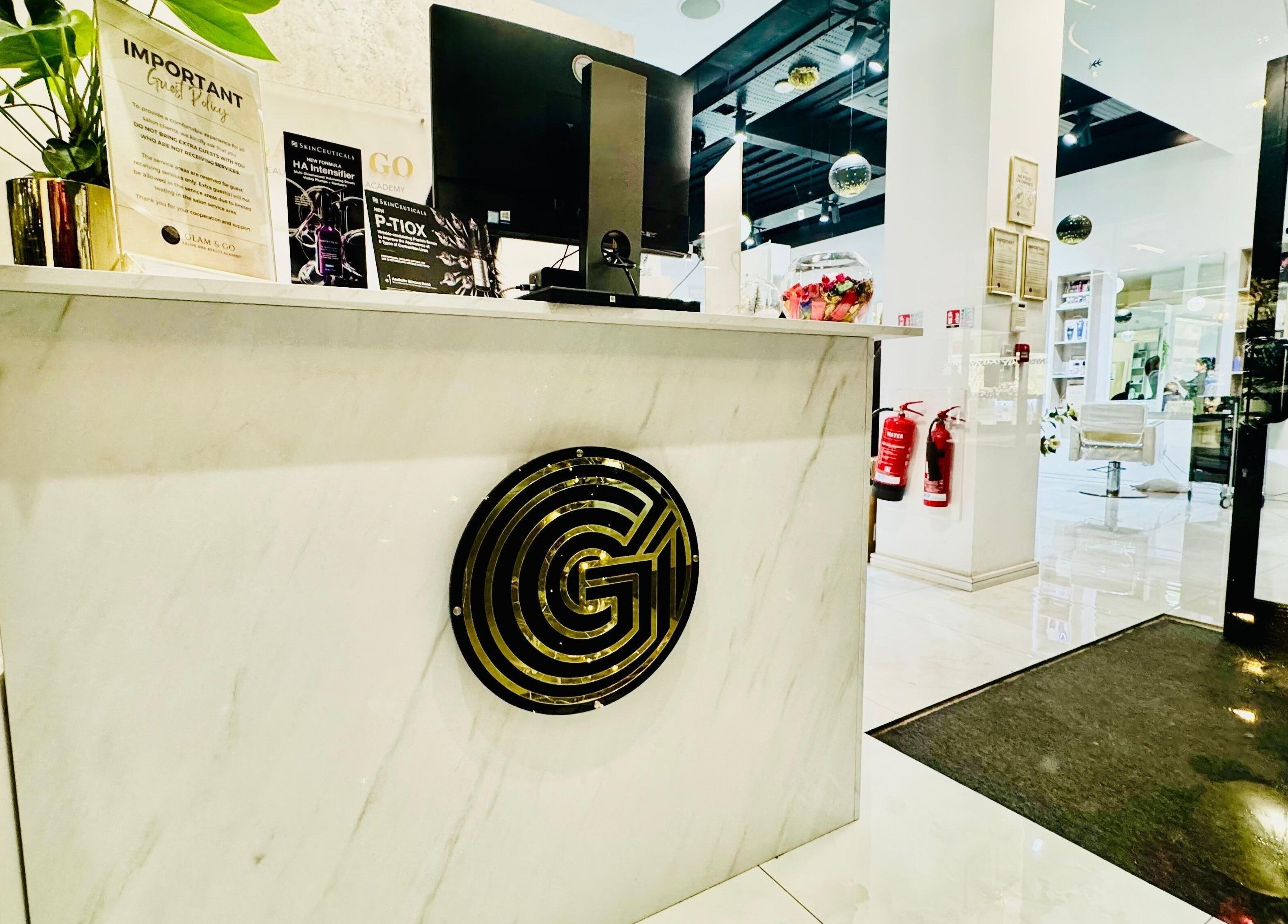 Chic reception at Glam & Go Hounslow, Hounslow, England, GB with modern decor and welcoming ambiance.