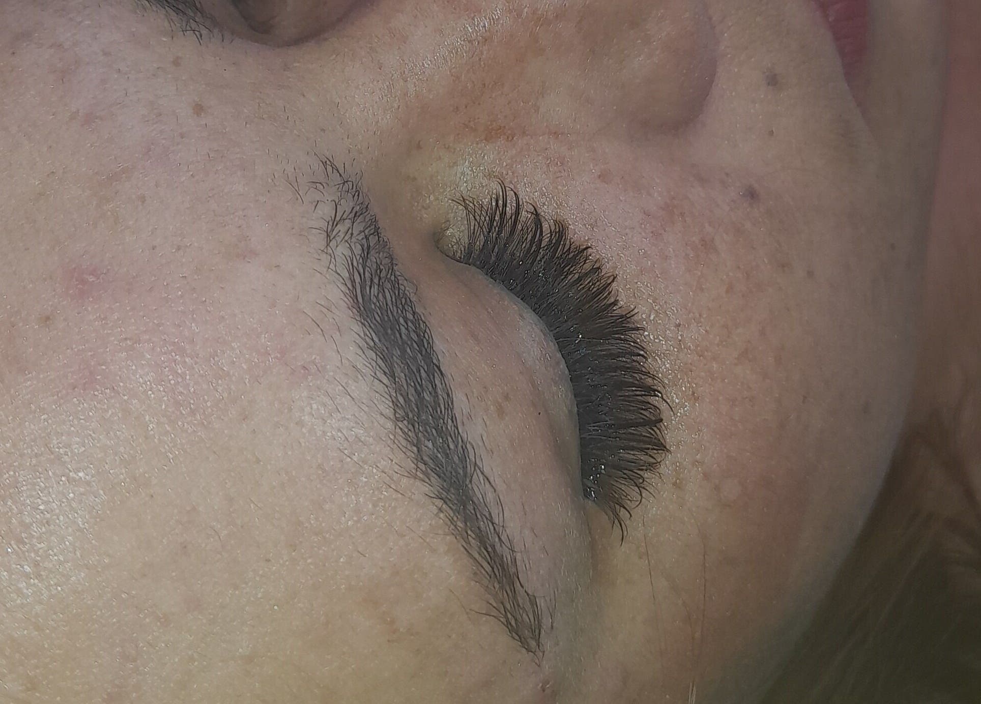 Close-up of a client's enhanced eyelashes at Femme de Fleur, Margate, Kwazulu-natal, ZA.