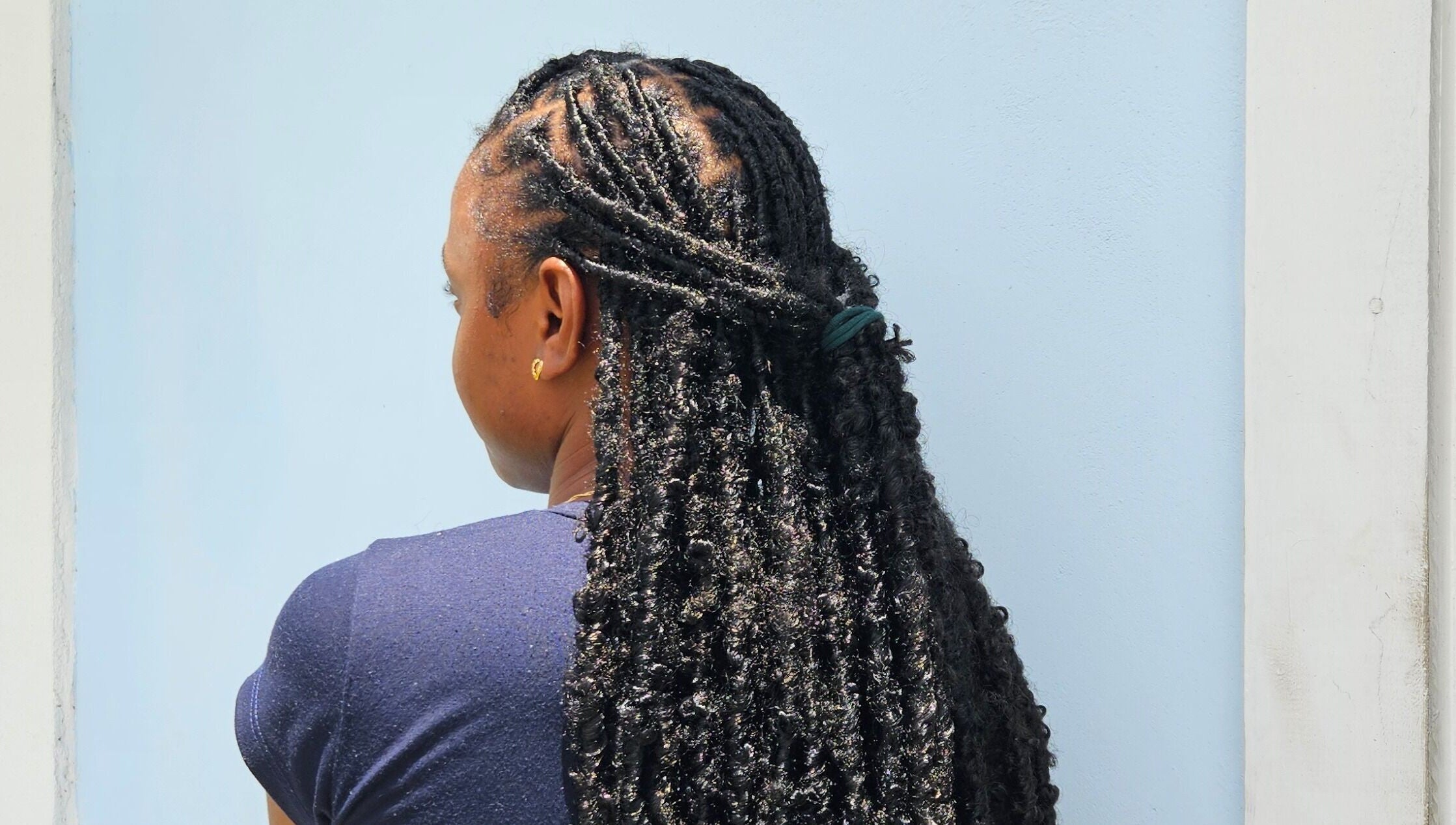 Elegant braided hairstyle at The Slayhouse.gy, Golden Grove, east bank demerara, GY.