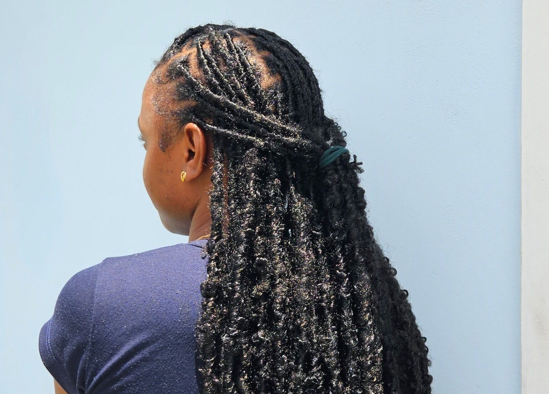 Elegant braided hairstyle at The Slayhouse.gy, Golden Grove, east bank demerara, GY.