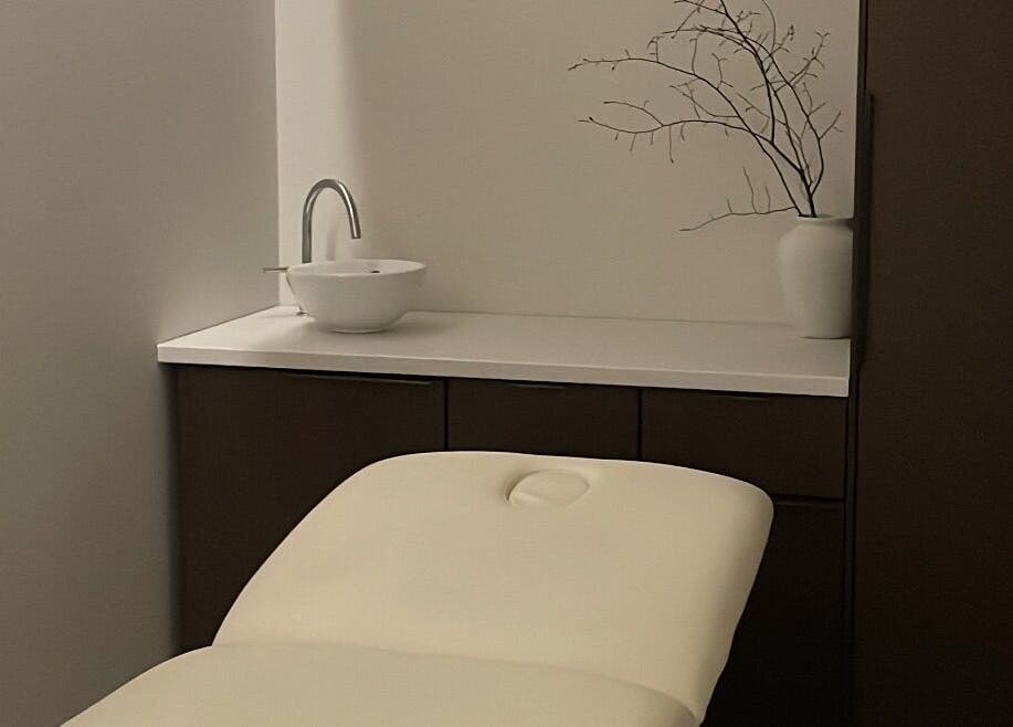 Tranquil therapy room at Wynter and Co, Newcastle upon Tyne, England, GB featuring a plush treatment table.