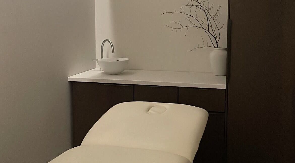 Tranquil therapy room at Wynter and Co, Newcastle upon Tyne, England, GB featuring a plush treatment table.