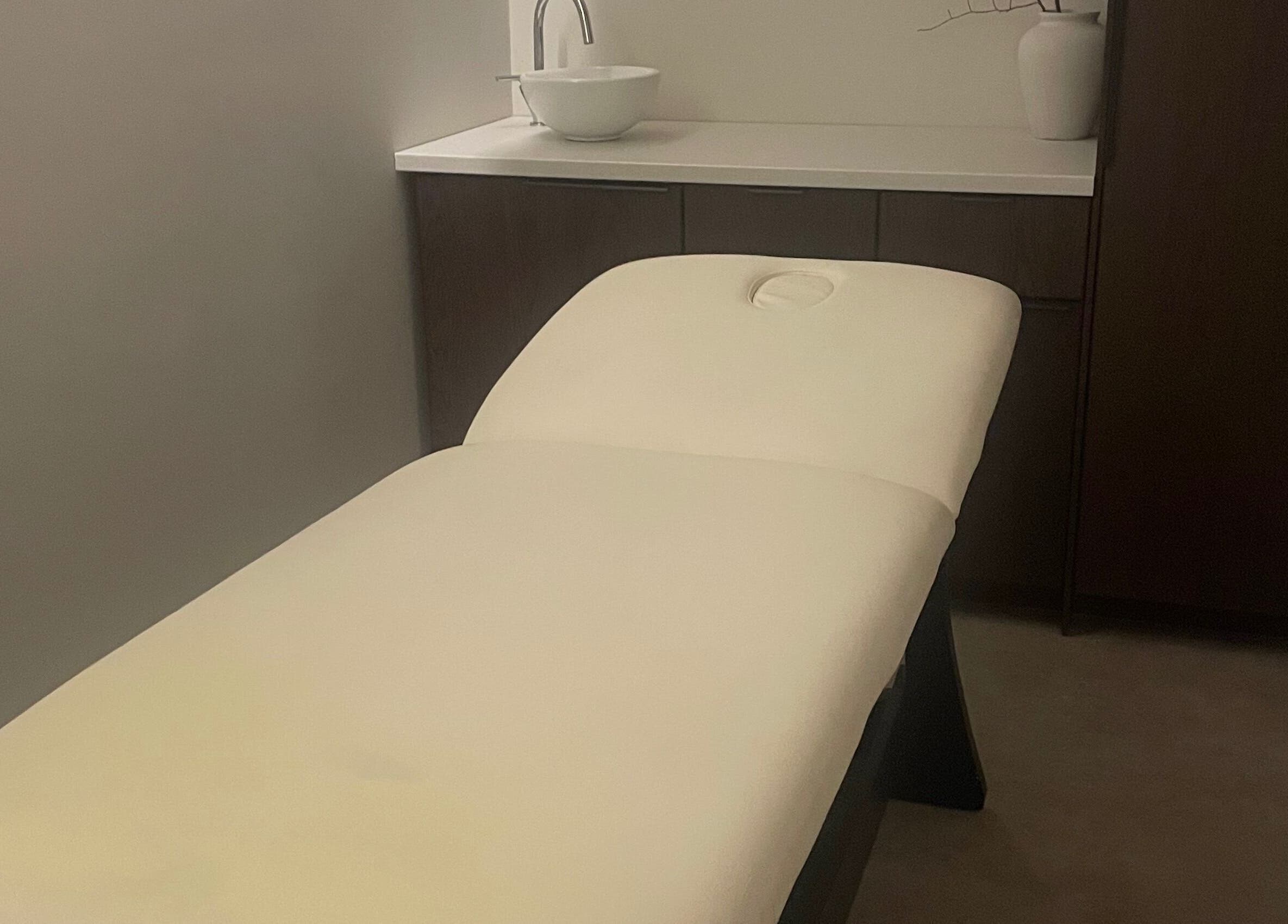 Relaxing massage bed at Wynter and Co, Newcastle upon Tyne, England, GB, offering serene wellness experiences.