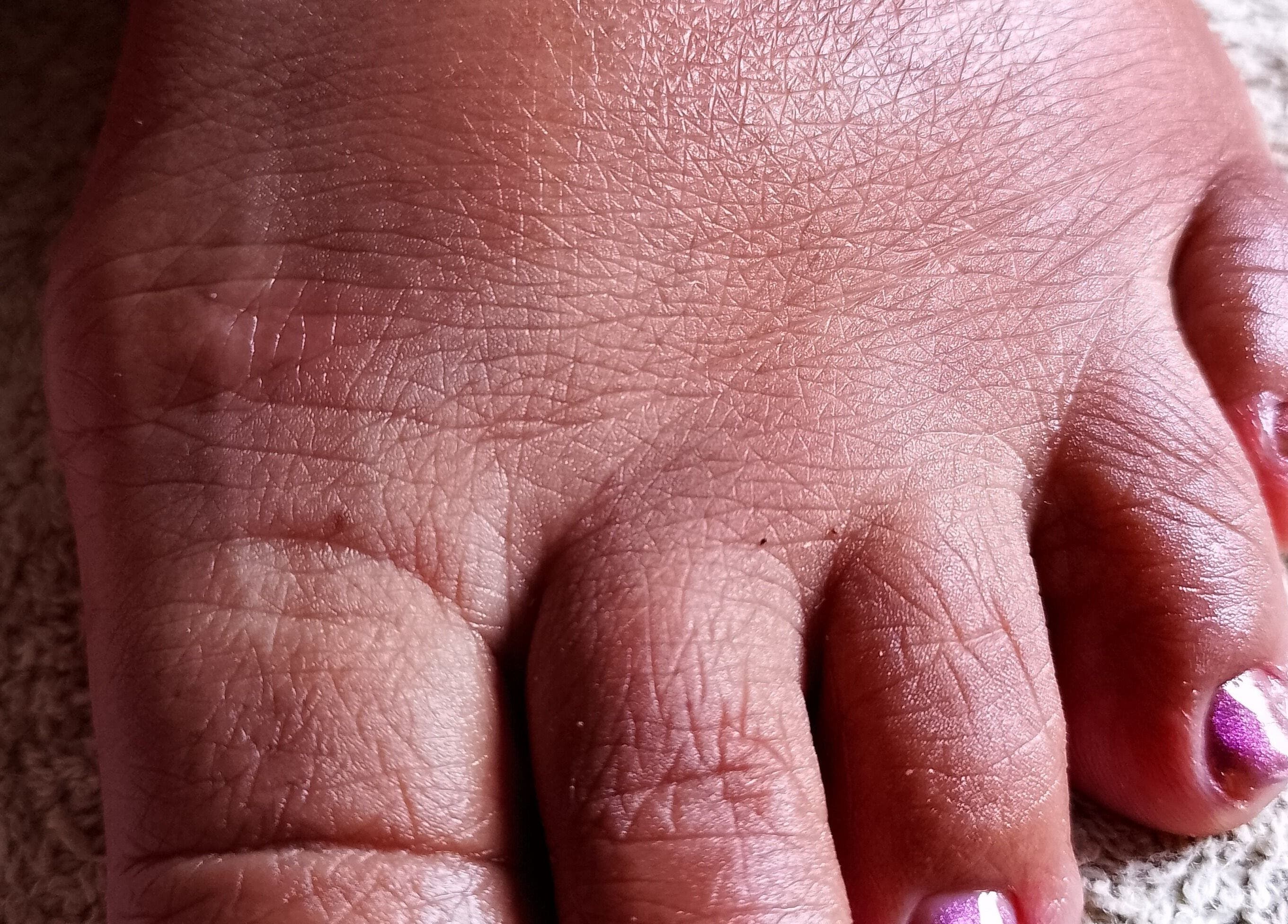 Close-up of beautifully painted toenails at PinkyM nails, Ennerdale, Gauteng, ZA, showcasing artistry and care.