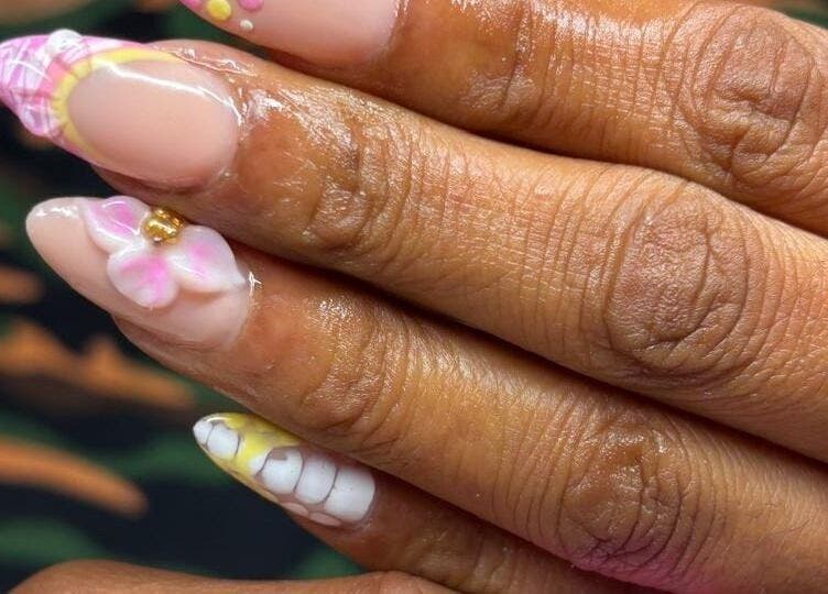 Exquisite floral nail art at PinkyM Nails, Ennerdale, Gauteng, ZA showcasing vibrant, intricate designs.