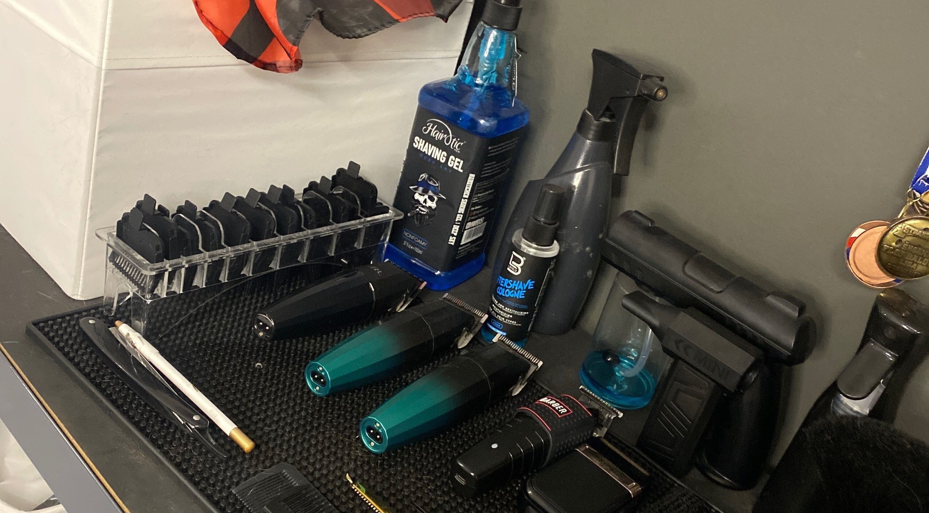 Barber tools at Jonyblendz, Strakonice, Jihočeský Kraj, CZ. Clippers and shaving gel neatly arranged.