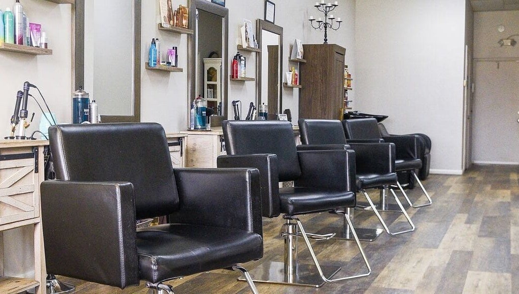Modern styling chairs at Meraki Salon, Port St. Lucie, Florida, US, showcasing a sleek and inviting ambiance.