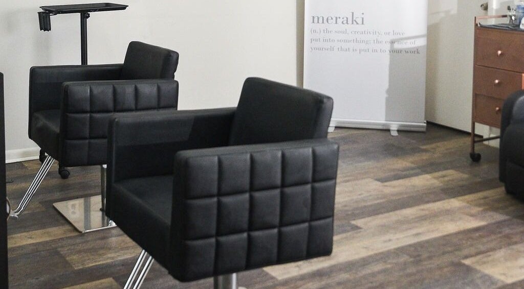 Elegant styling chairs at Meraki Salon, Port St. Lucie, Florida, US, offering a chic, relaxing atmosphere.