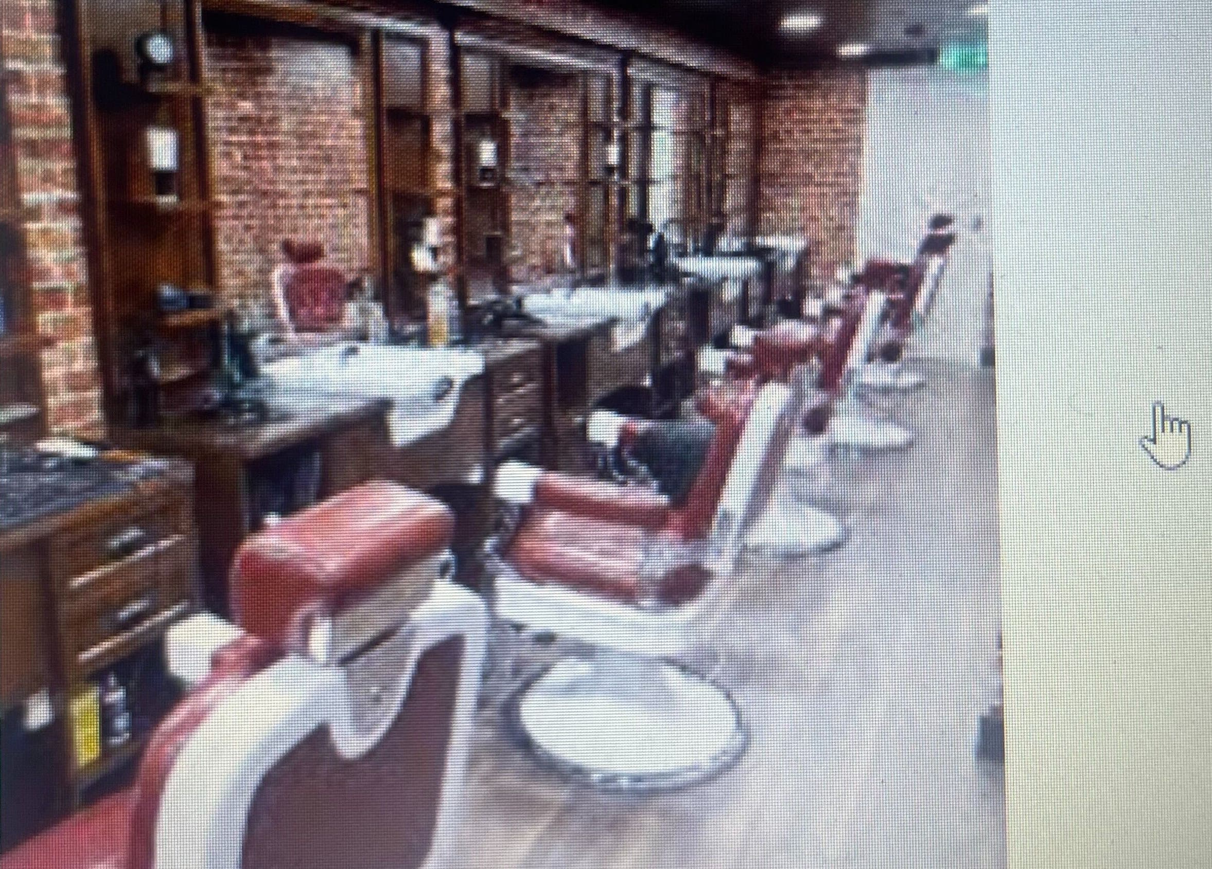 Interior of Barber Automation showing stylish red chairs in Swords, County Dublin, IE.