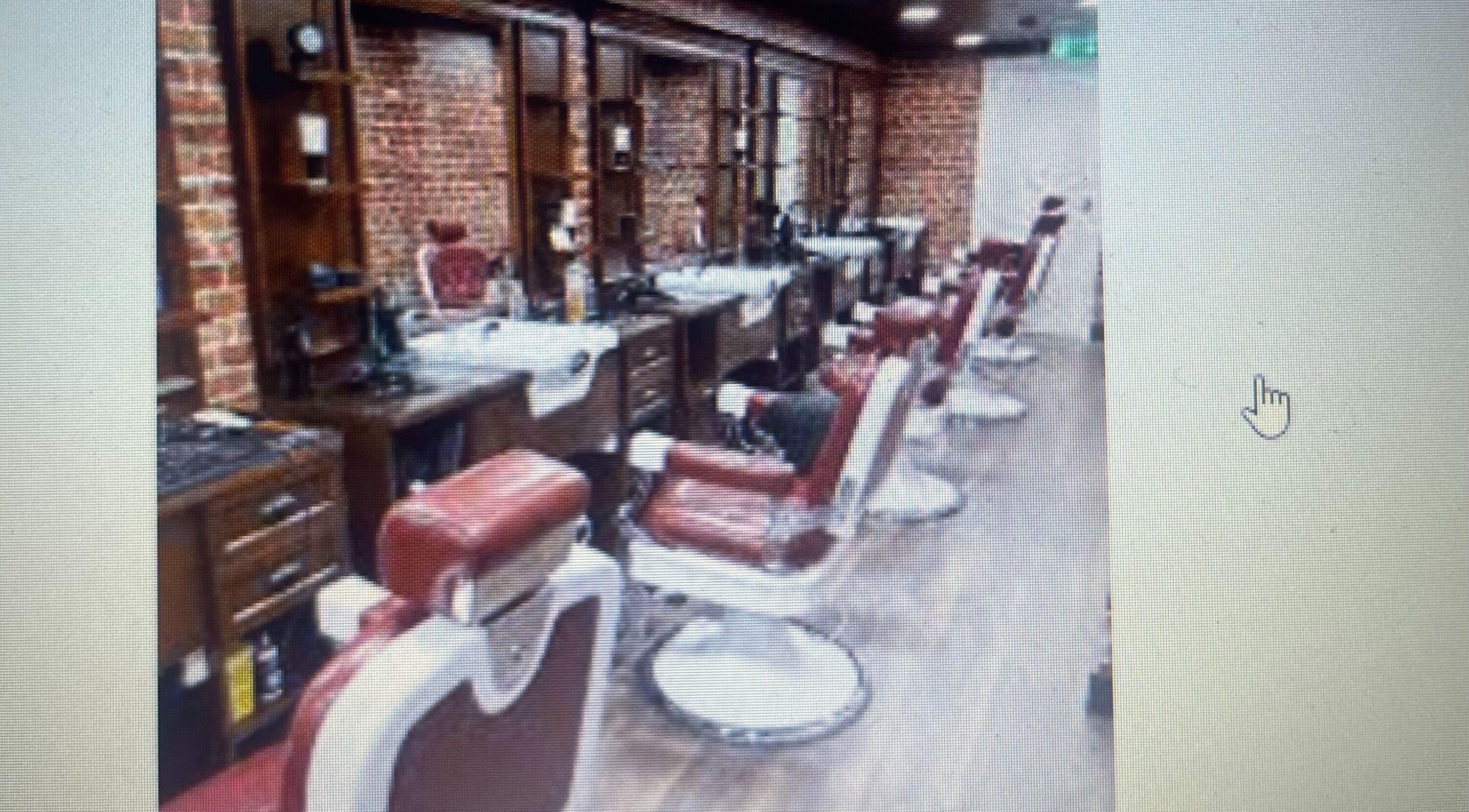 Interior of Barber Automation showing stylish red chairs in Swords, County Dublin, IE.
