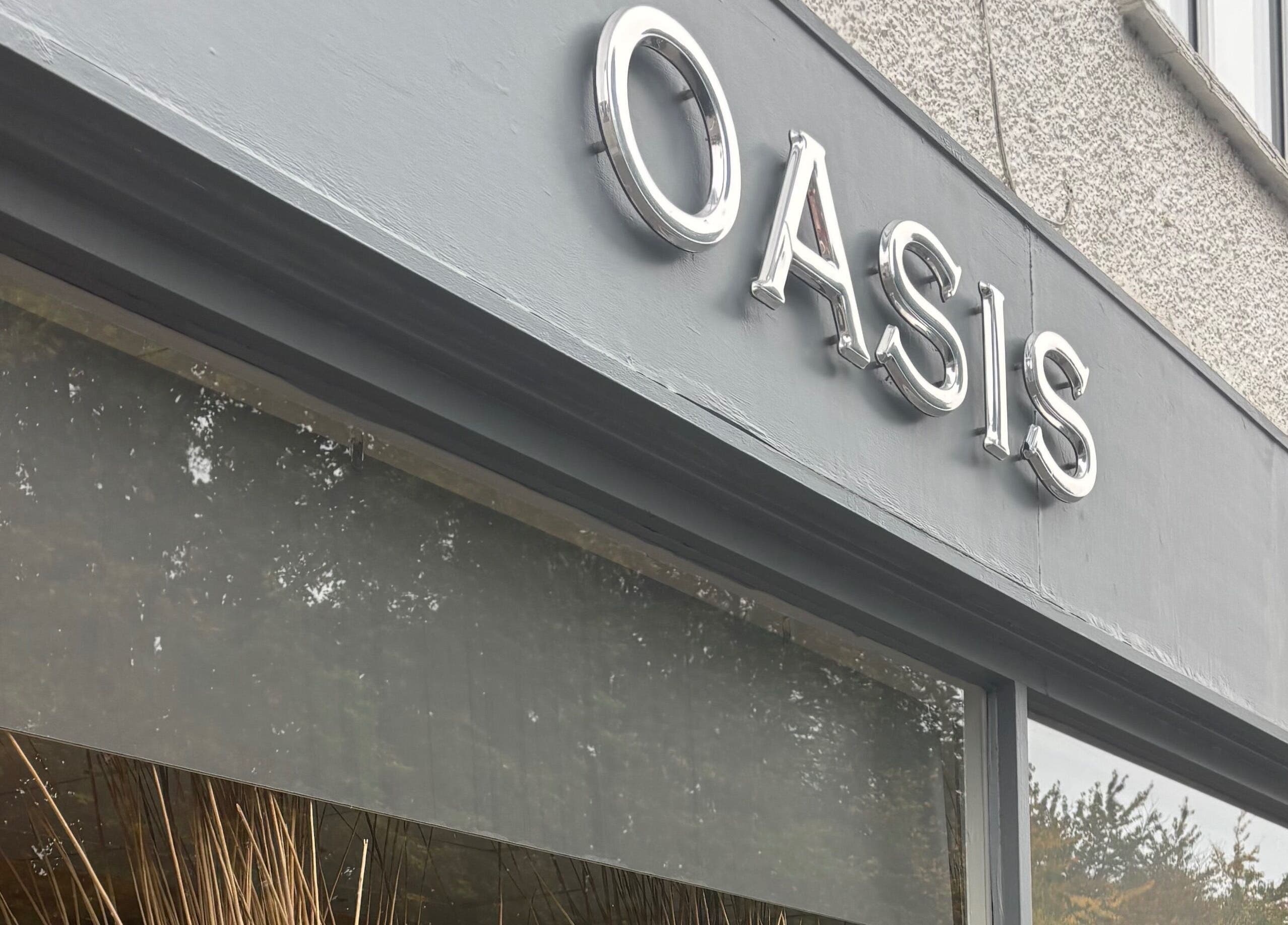 Signage of Oasis beauty and wellness venue, Amersham, England, GB.