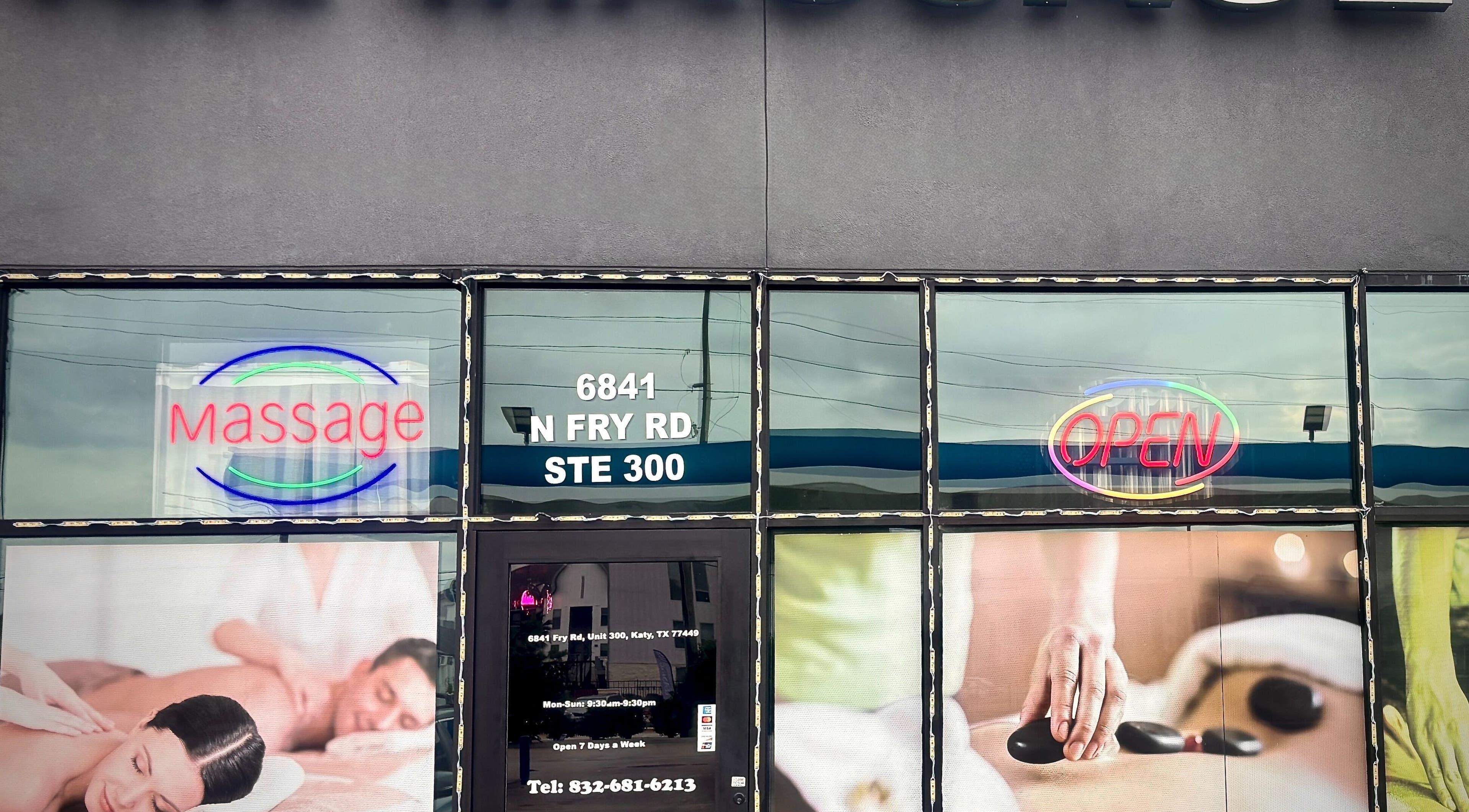 Front of RR Massage in Katy, Texas, US showcasing massage and open signs.