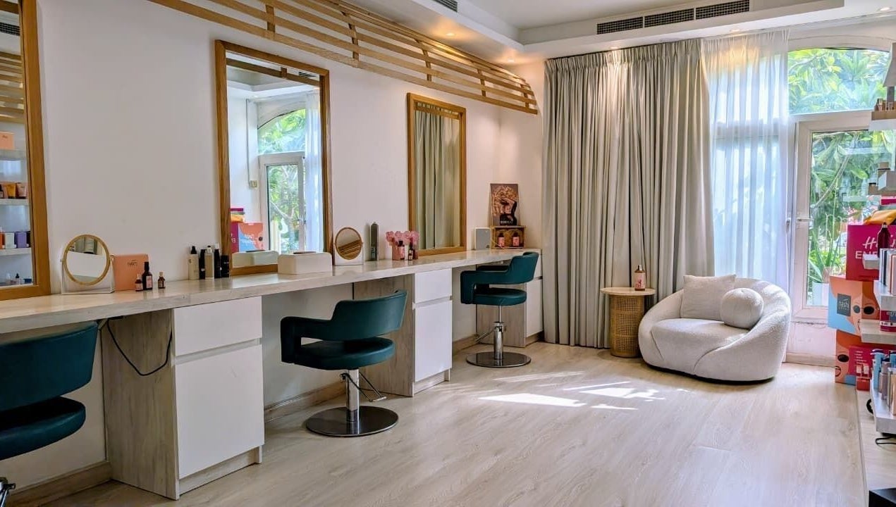 Villa Thalgo - Dubai offers a serene beauty room with modern chairs and natural light. Location: Dubai, AE.