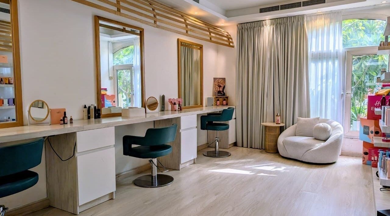 Villa Thalgo - Dubai offers a serene beauty room with modern chairs and natural light. Location: Dubai, AE.