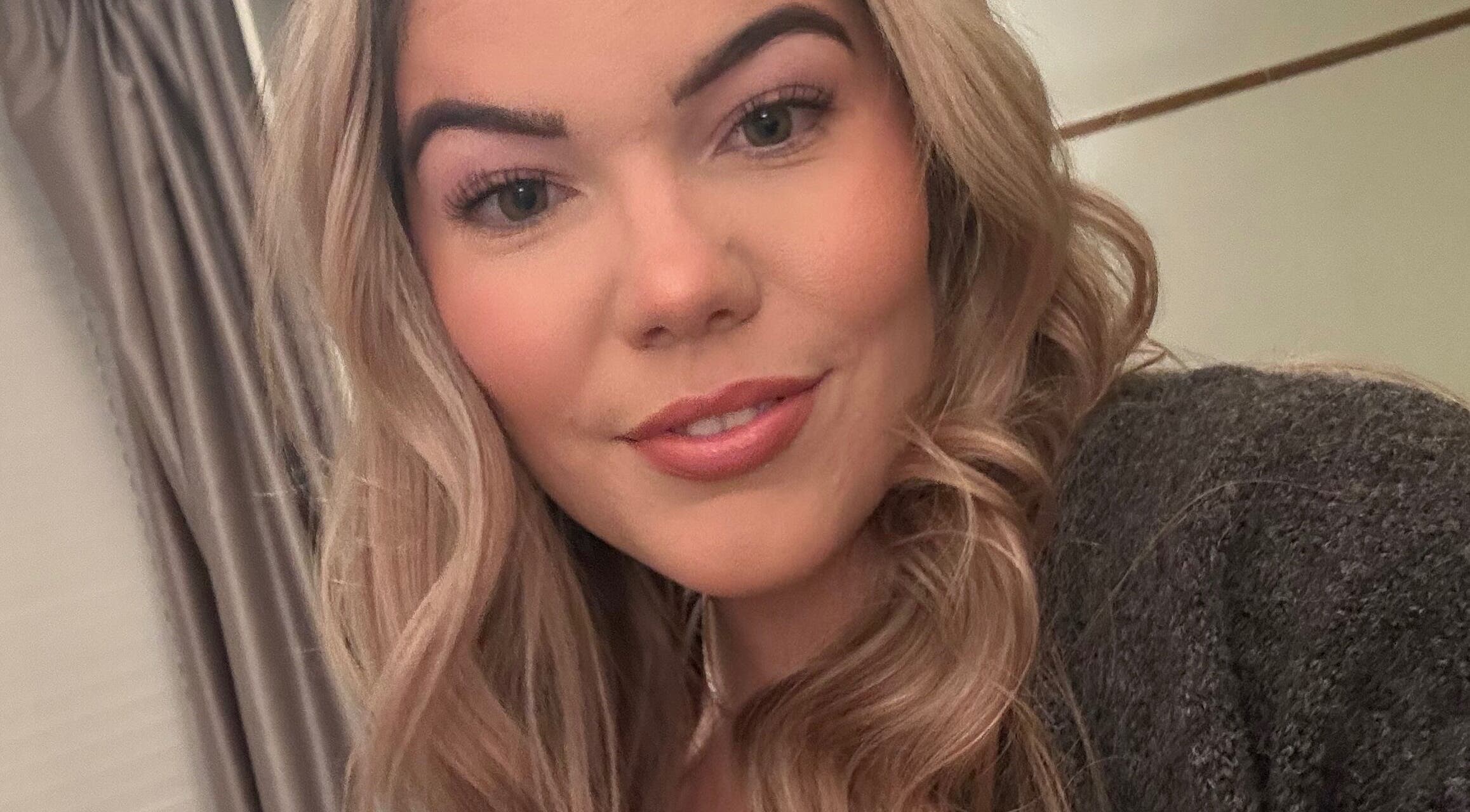 Smiling person with styled hair at Livs Brow Studio, Earlswood, England, GB.