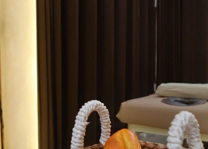 Tranquil spa room with massage table at Booty Bakery, Bali, Bali, ID, offering relaxation and wellness.