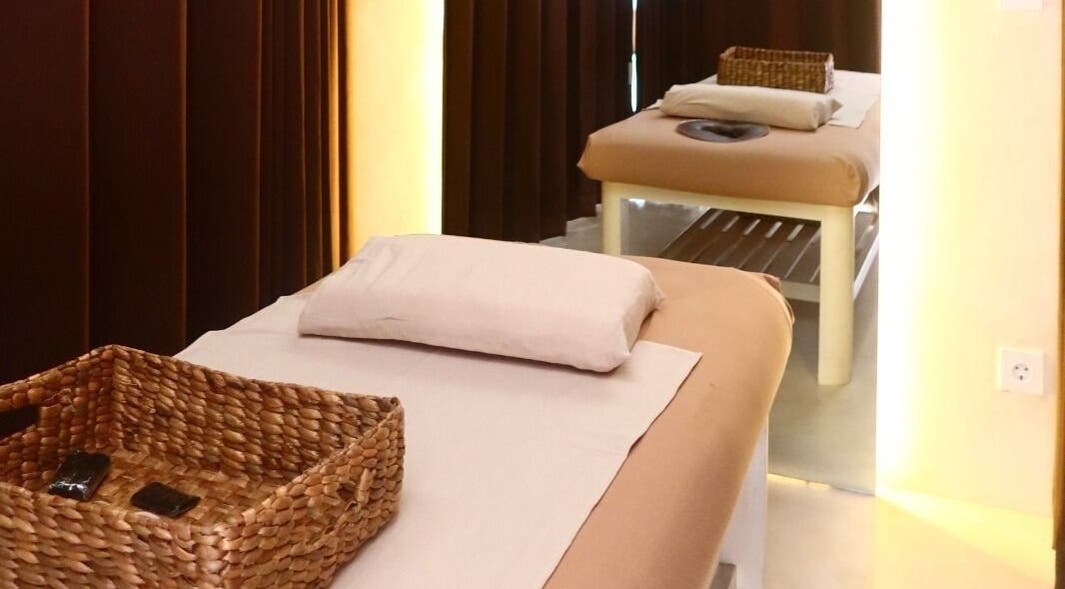 Cozy treatment room at Booty Bakery, Bali, Bali, ID, featuring comfortable massage tables and soft lighting.