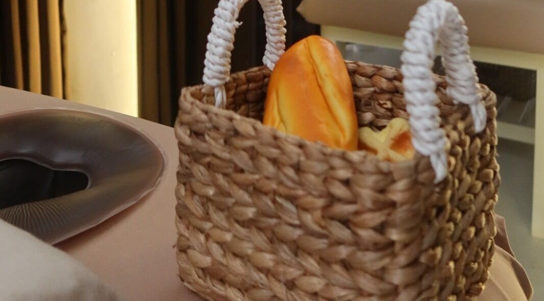 Relaxing spa setup with bread basket at Booty Bakery, Bali, Bali, ID
