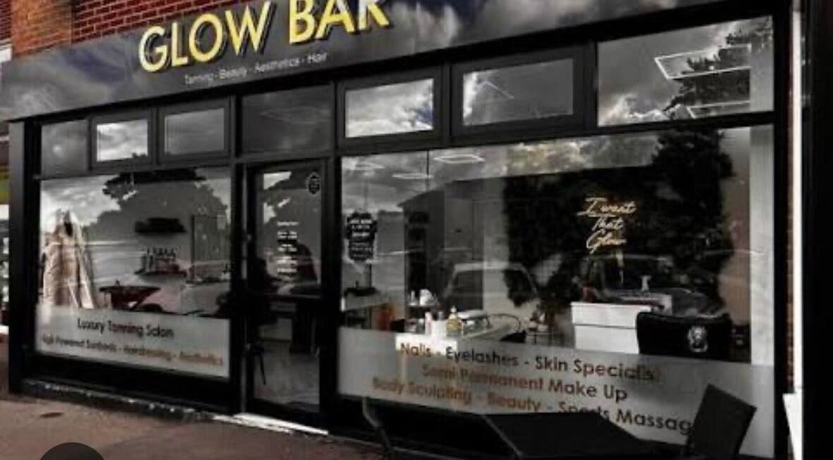 Exterior of The Glow Bar in Colchester, England, GB, showcasing beauty services signage.