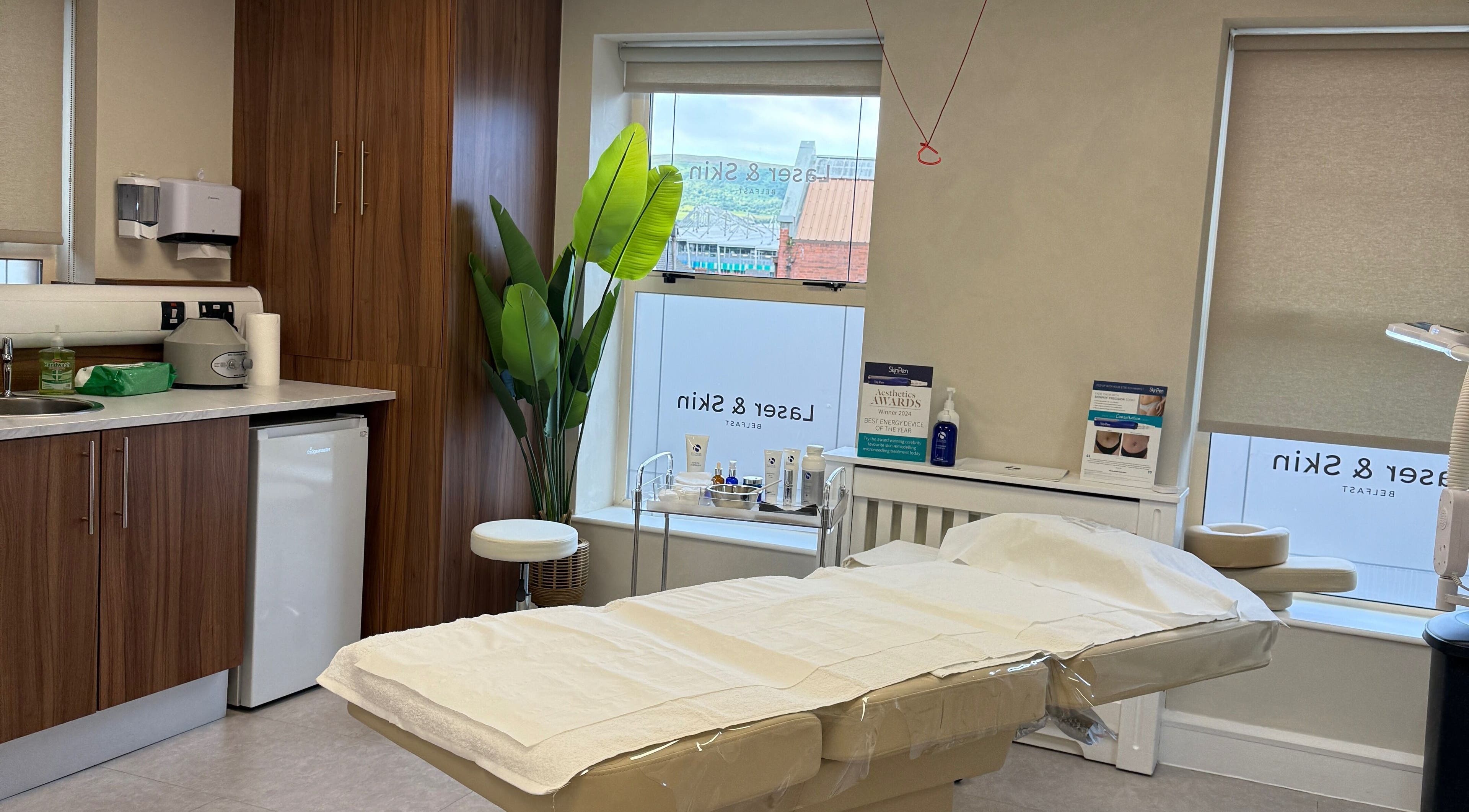 Relaxing treatment room at Laser & Skin Belfast, showcasing modern decor and facilities in Belfast, Northern Ireland, GB.