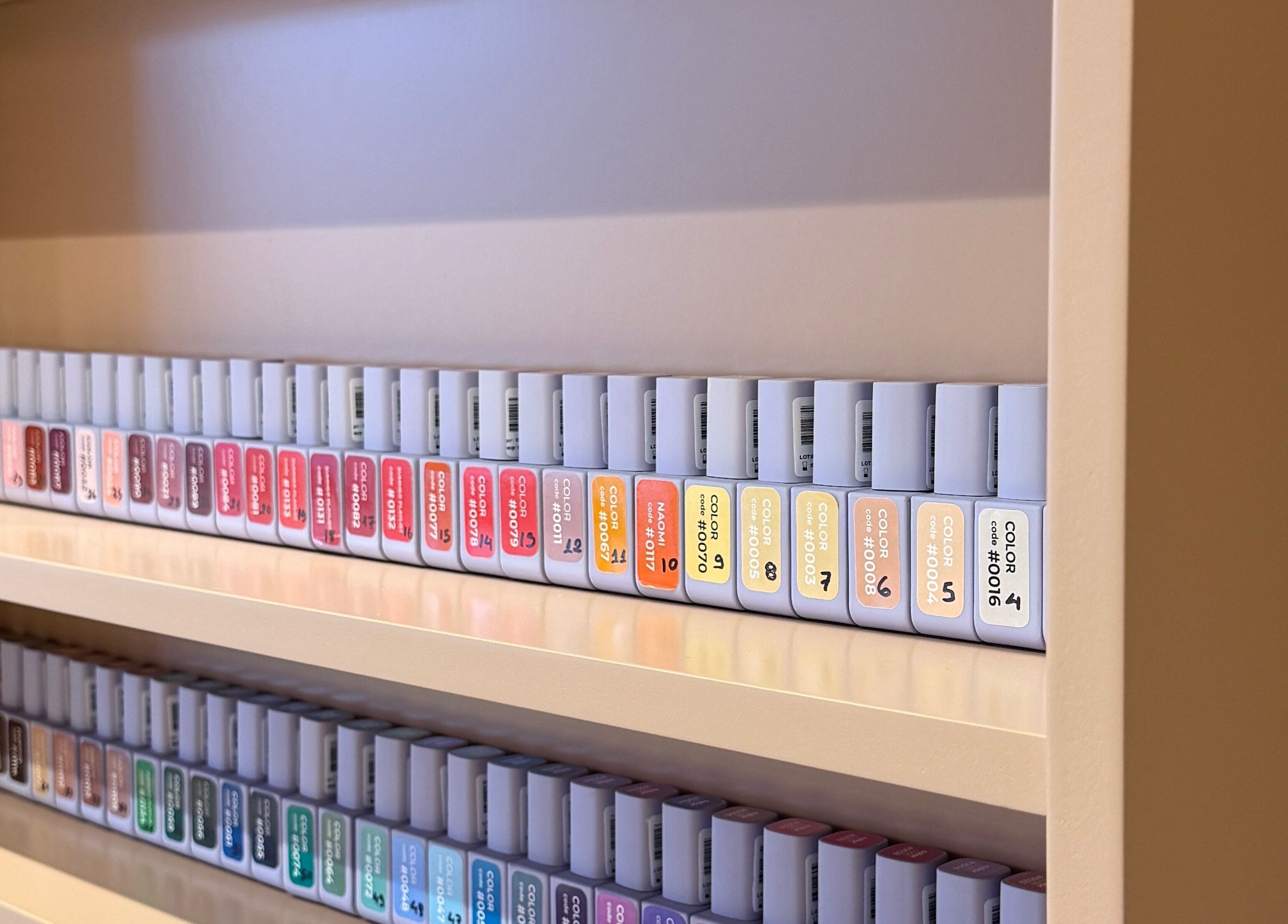 Colorful nail polish collection at GOLDFINCH NAILS STUDIO, Haslemere, England, GB.