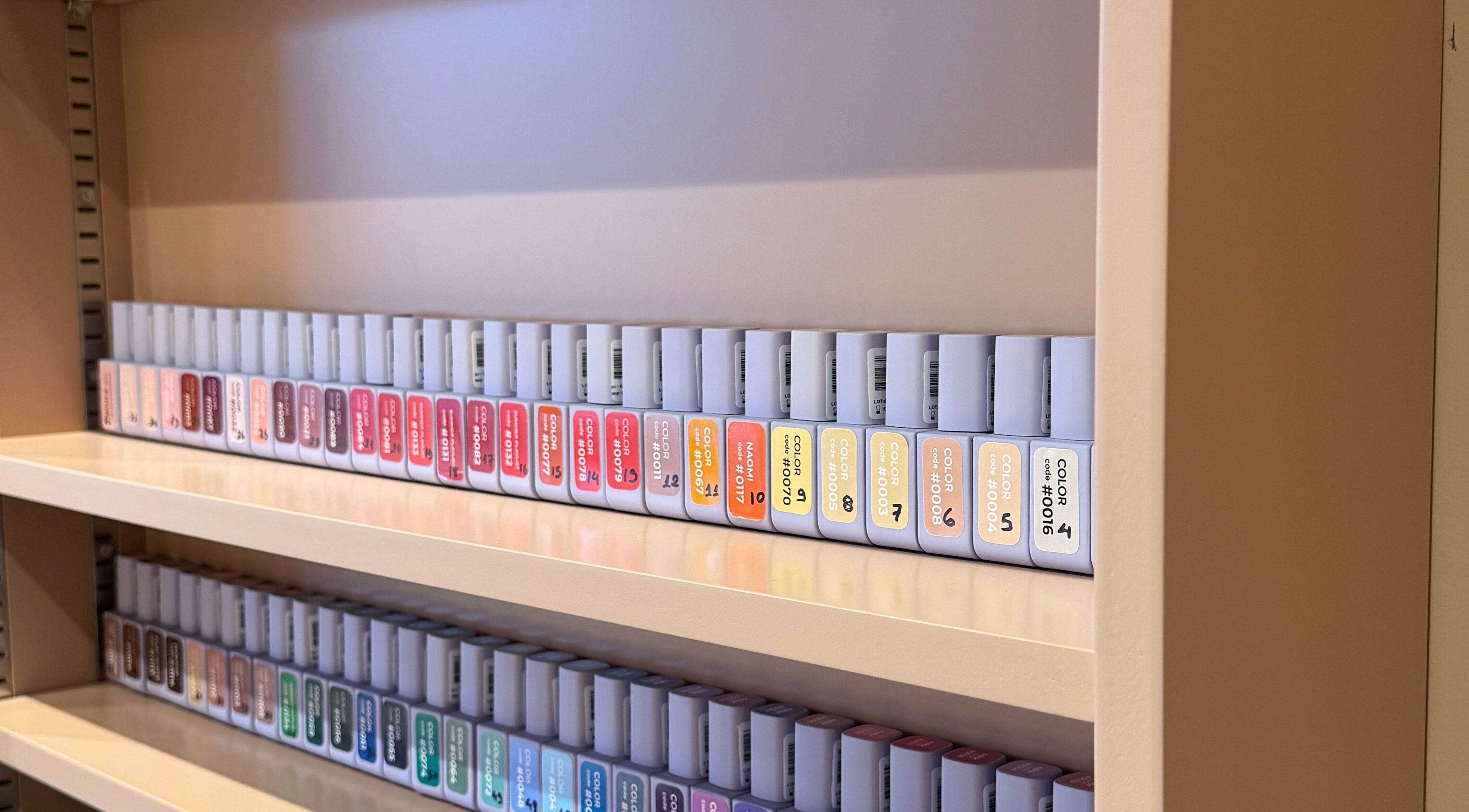 Colorful nail polish collection at GOLDFINCH NAILS STUDIO, Haslemere, England, GB.