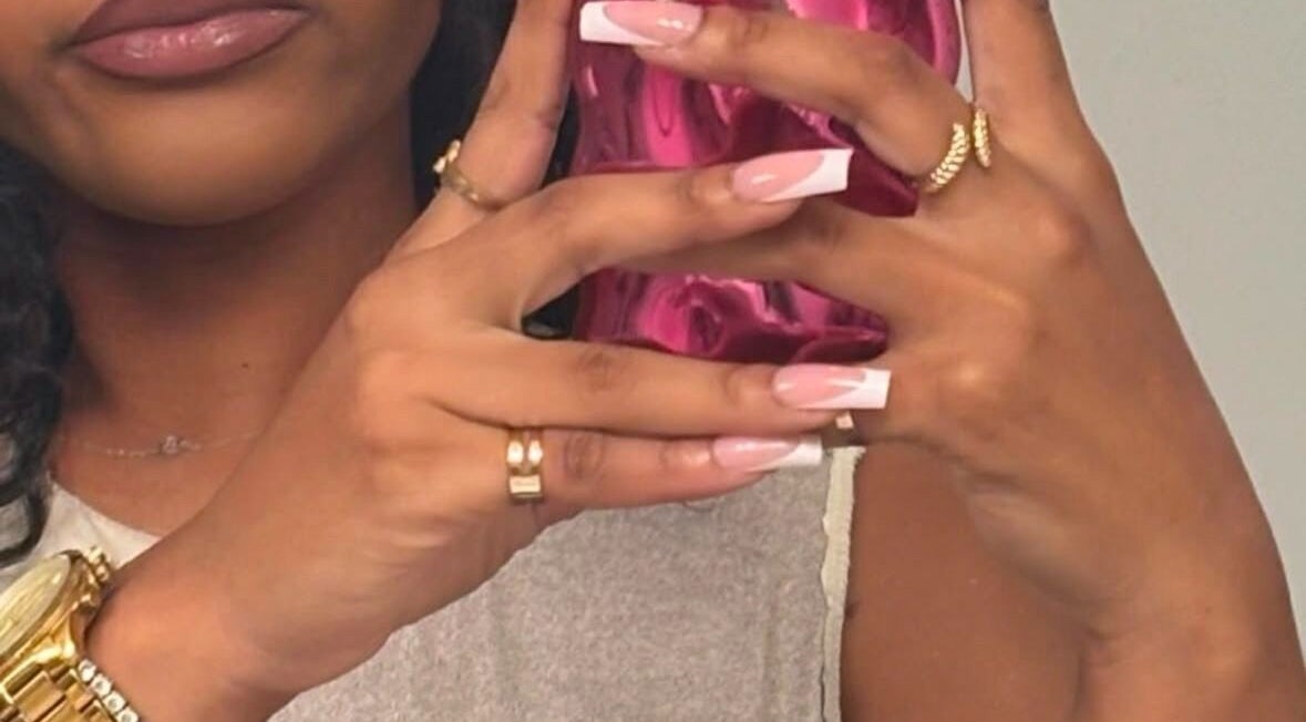 Stylish pink nails with rings at Quick Presses by Mink, Kingston, St. Andrew Parish, JM.