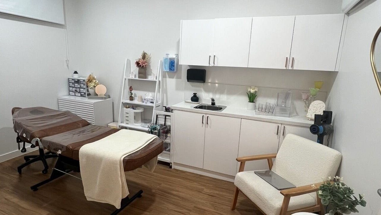 Meliaesthetics treatment room with massage table and modern decor, Melbourne, Victoria, AU.