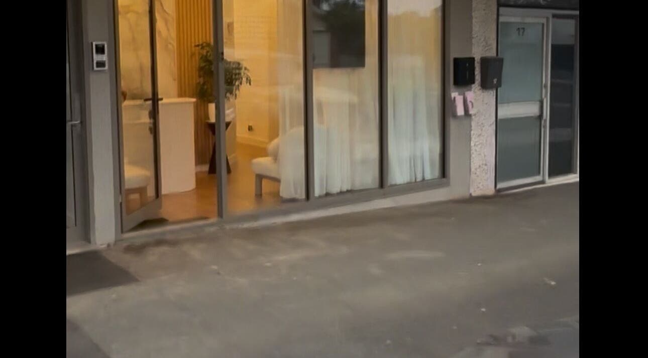 Front view of Meliaesthetics, a beauty venue in Melbourne, Victoria, AU, showcasing glass doors and welcoming interior.