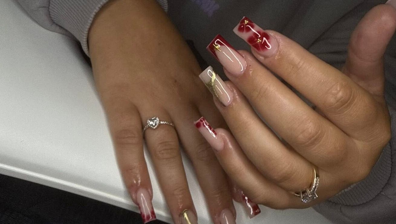 Stylish red and gold nail art at Nails Byscarlett.Xo, Kidderminster, England, GB. A showcase of elegant nail design.