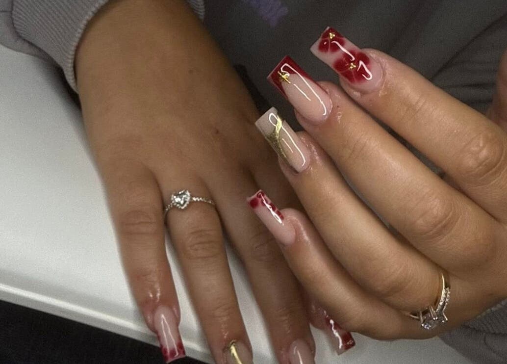 Stylish red and gold nail art at Nails Byscarlett.Xo, Kidderminster, England, GB. A showcase of elegant nail design.