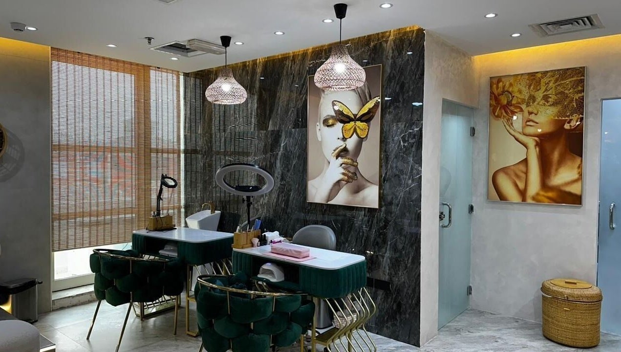 Interior of Bronzette Beauty Salon L.L.C, Dubai, AE; chic decor, plush seating, artistic wall art.