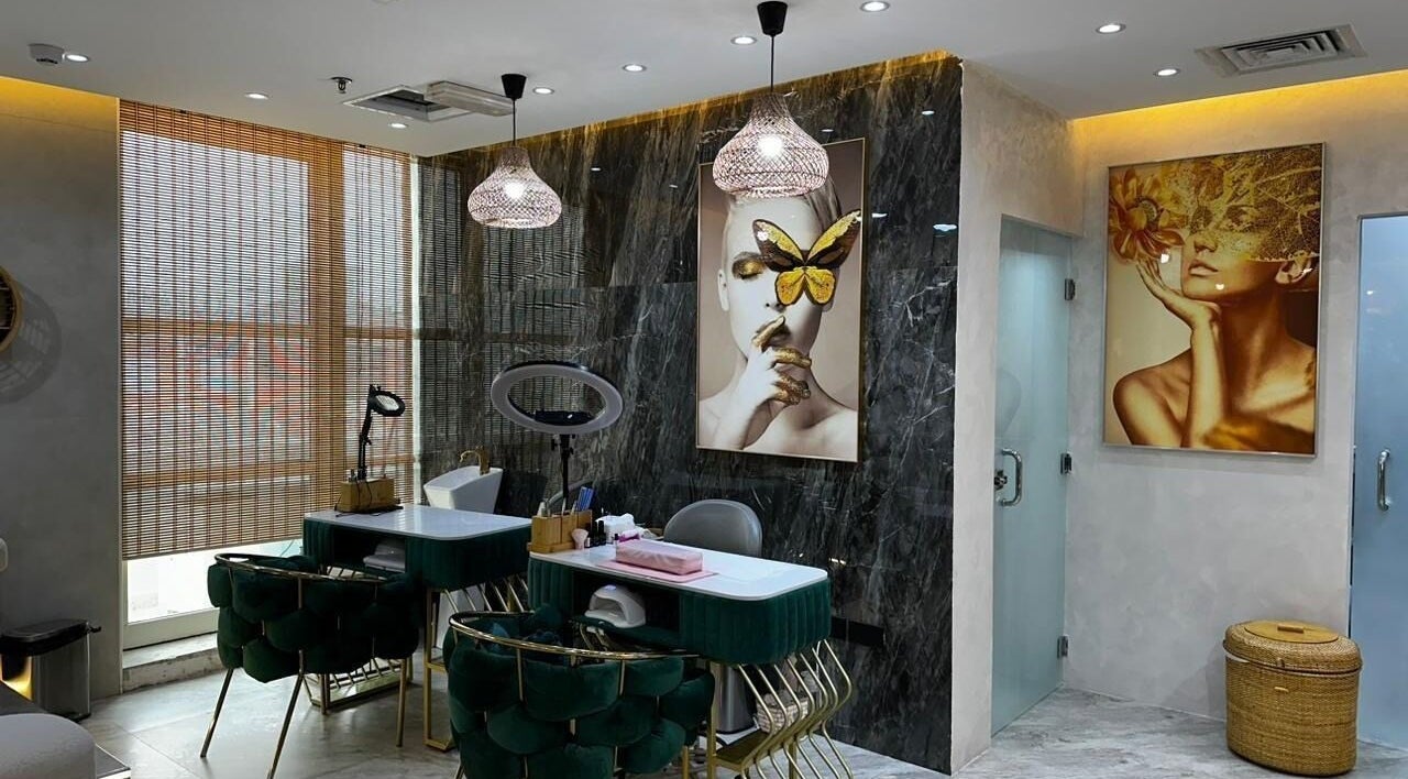 Interior of Bronzette Beauty Salon L.L.C, Dubai, AE; chic decor, plush seating, artistic wall art.