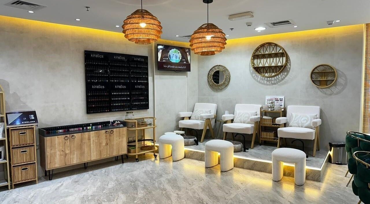 Elegant interior of Bronzette Beauty Salon L.L.C, Dubai, AE, featuring plush seating and stylish decor.