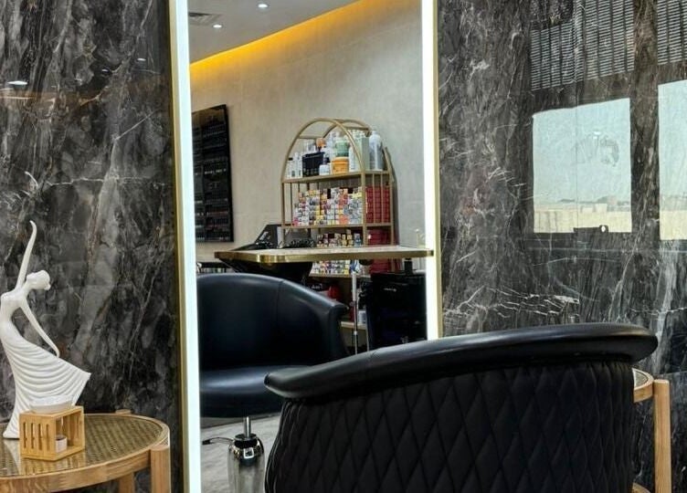 Chic interior of Bronzette Beauty Salon L.L.C in Dubai, AE showcasing luxury seating and decor.