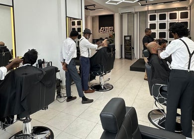 Raula Barbershop Rajagiriya, Sri Jayawardenepura Kotte, offers stylish haircuts in a modern, vibrant setting.