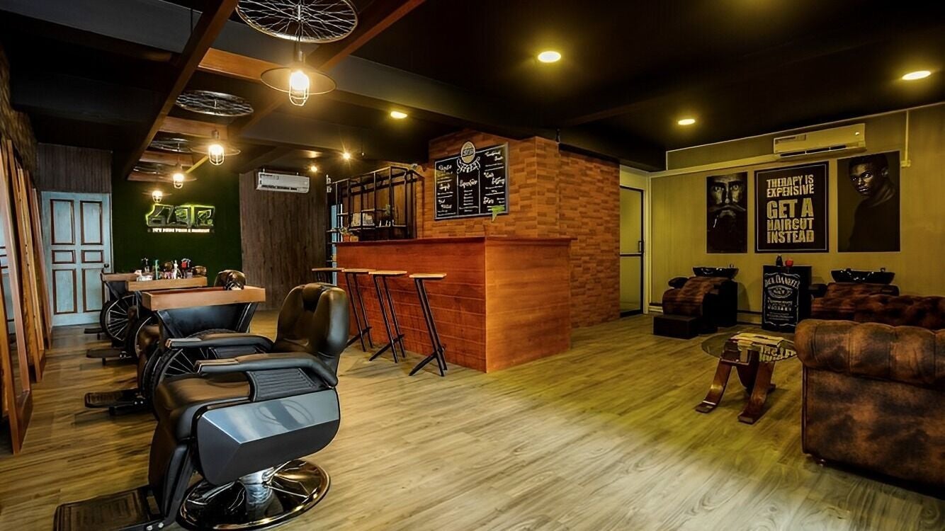 Modern interior of Raula Barbershop Baseline Road, Colombo, Western Province, LK. Stylish chairs and decor.