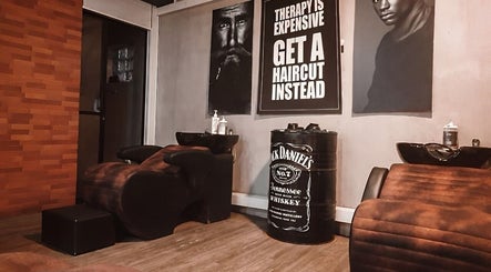 Stylish interior of Raula Barbershop Baseline Road in Colombo, Western Province, LK with barber chairs and edgy decor.