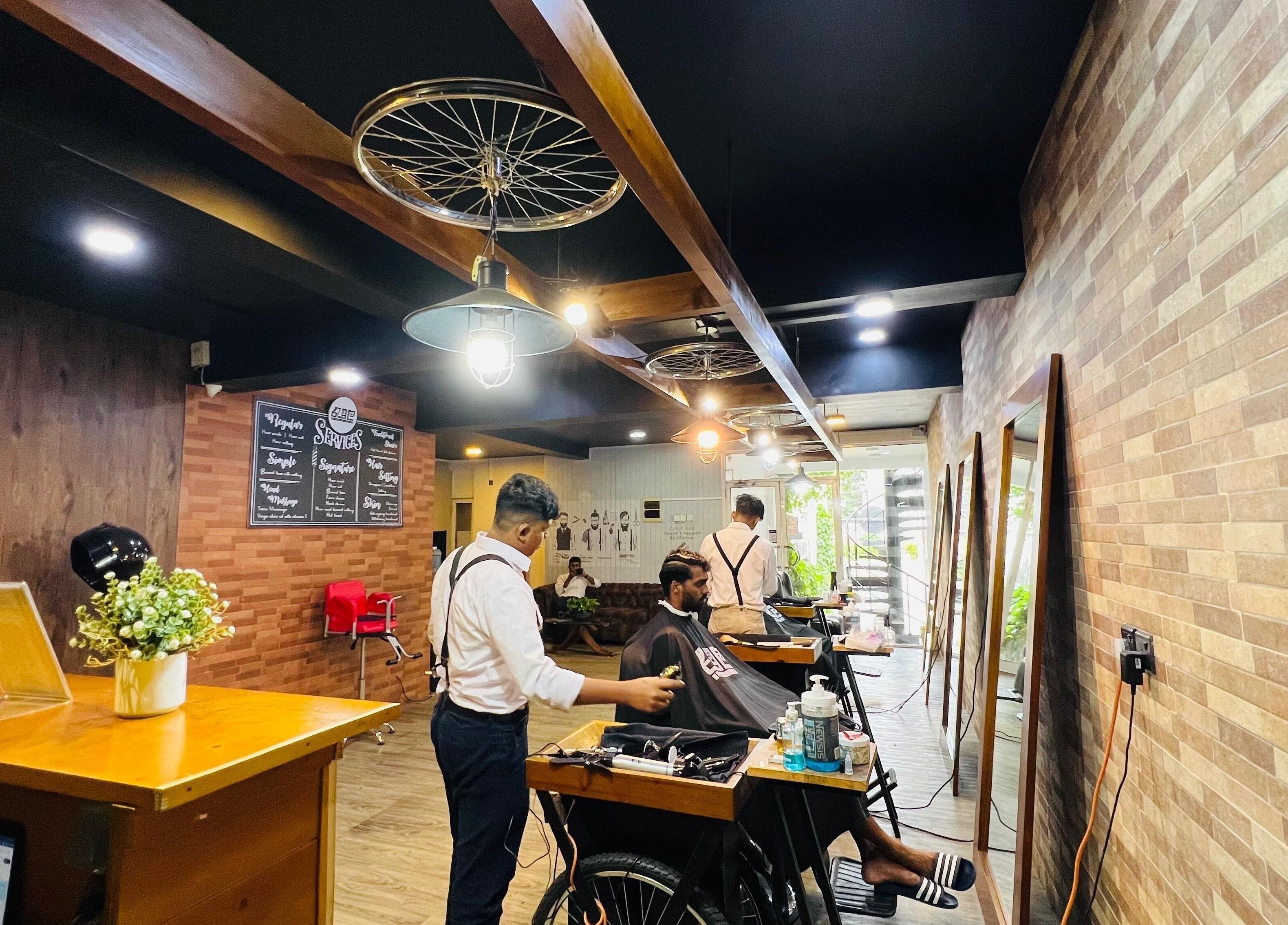 Interior of Raula Barbershop Baseline Road, Colombo, Western Province, LK with vintage barber chairs and decor.