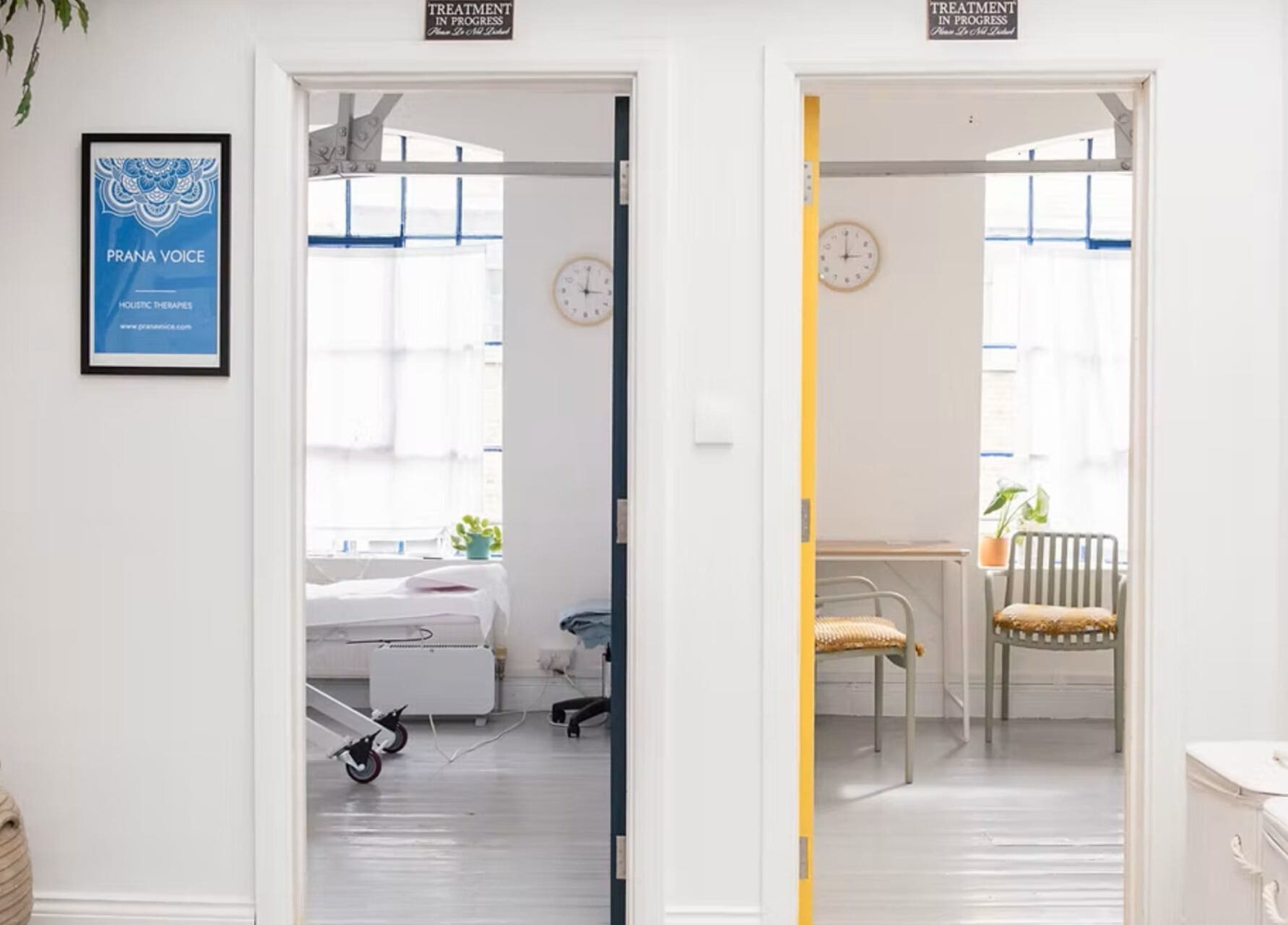 Calm therapy rooms at Venus Holistic Therapies at Prana Voice, London, England, GB with white decor.