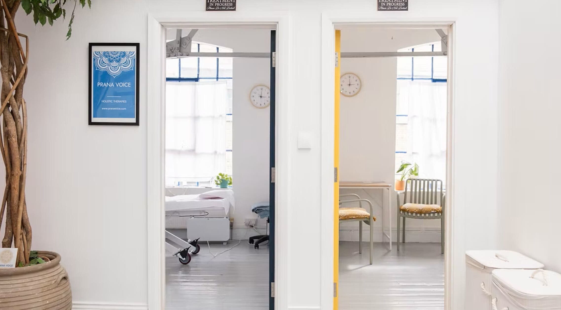 Calm therapy rooms at Venus Holistic Therapies at Prana Voice, London, England, GB with white decor.